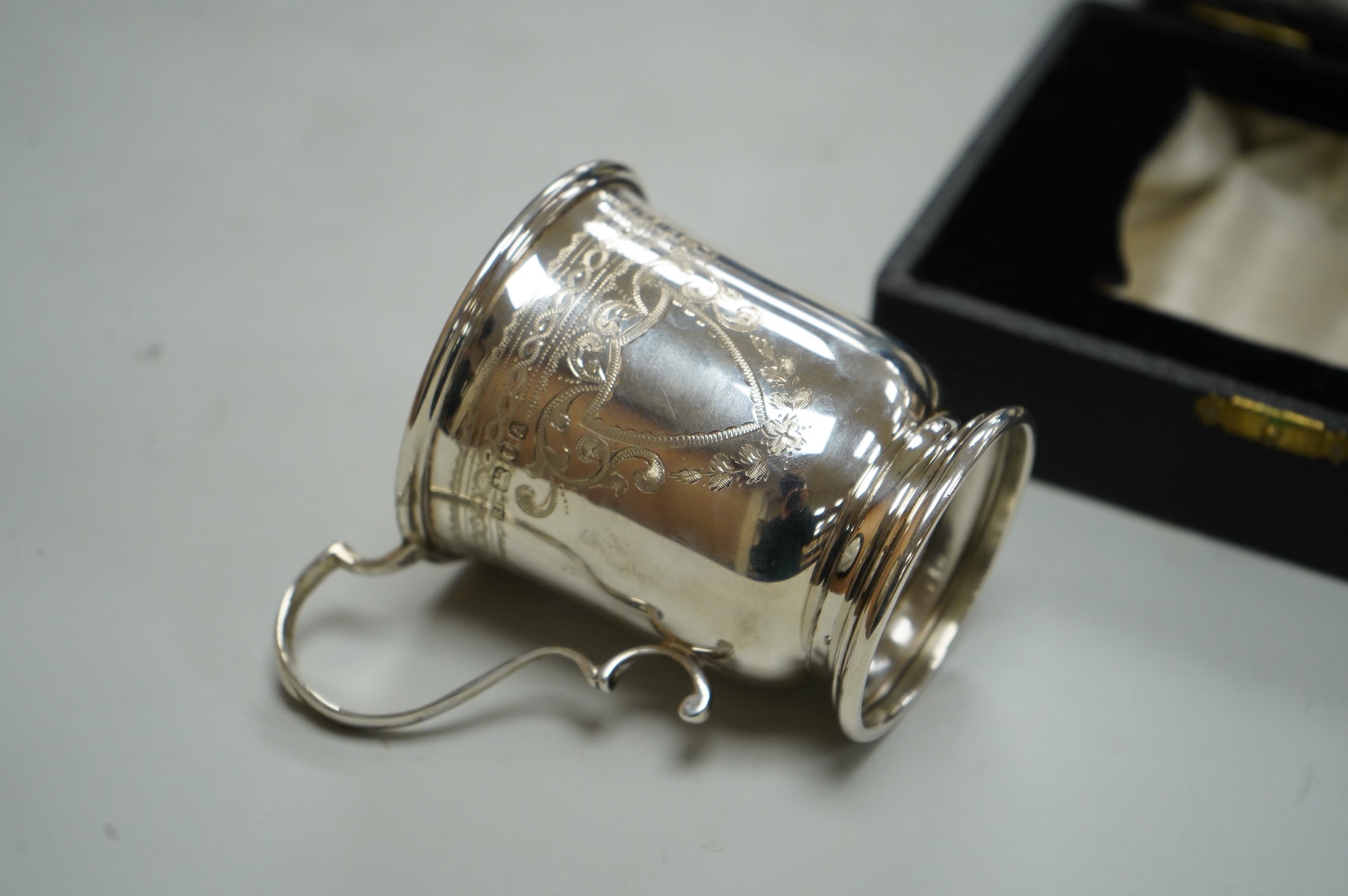 A George VI engraved silver christening mug, by Robert Pringle & Sons, London, 1936, 82mm, 2.8oz, in fitted case.